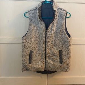 M light blue reversible vest. Fuzzy in one side smooth in the other!